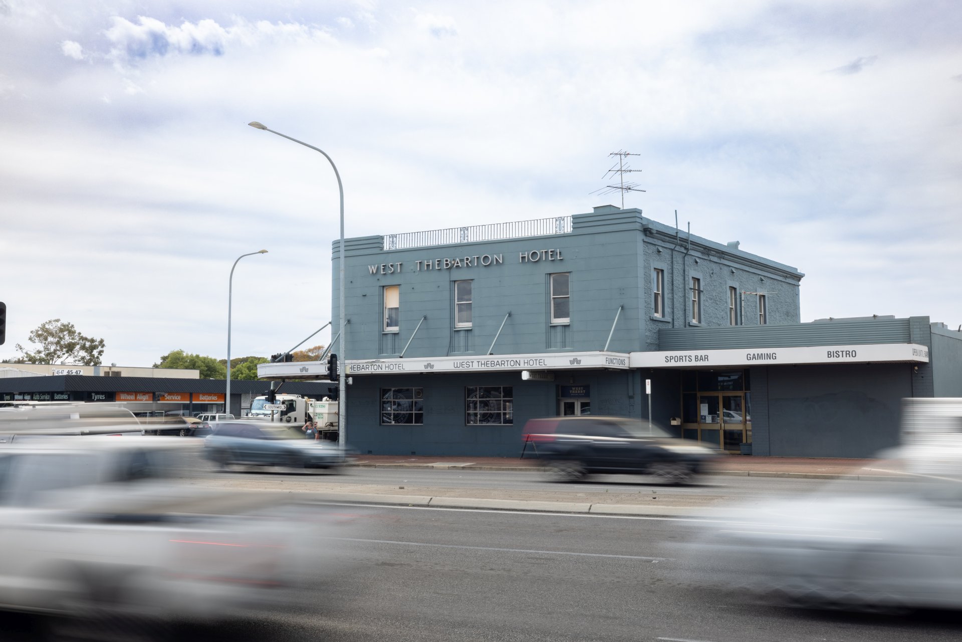 West Thebarton Hotel, a light blue heritage listed building.